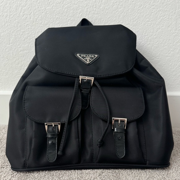 Prada backpack. Fairly used but in great condition. Perfect first designer bag! - Picture 1 of 5